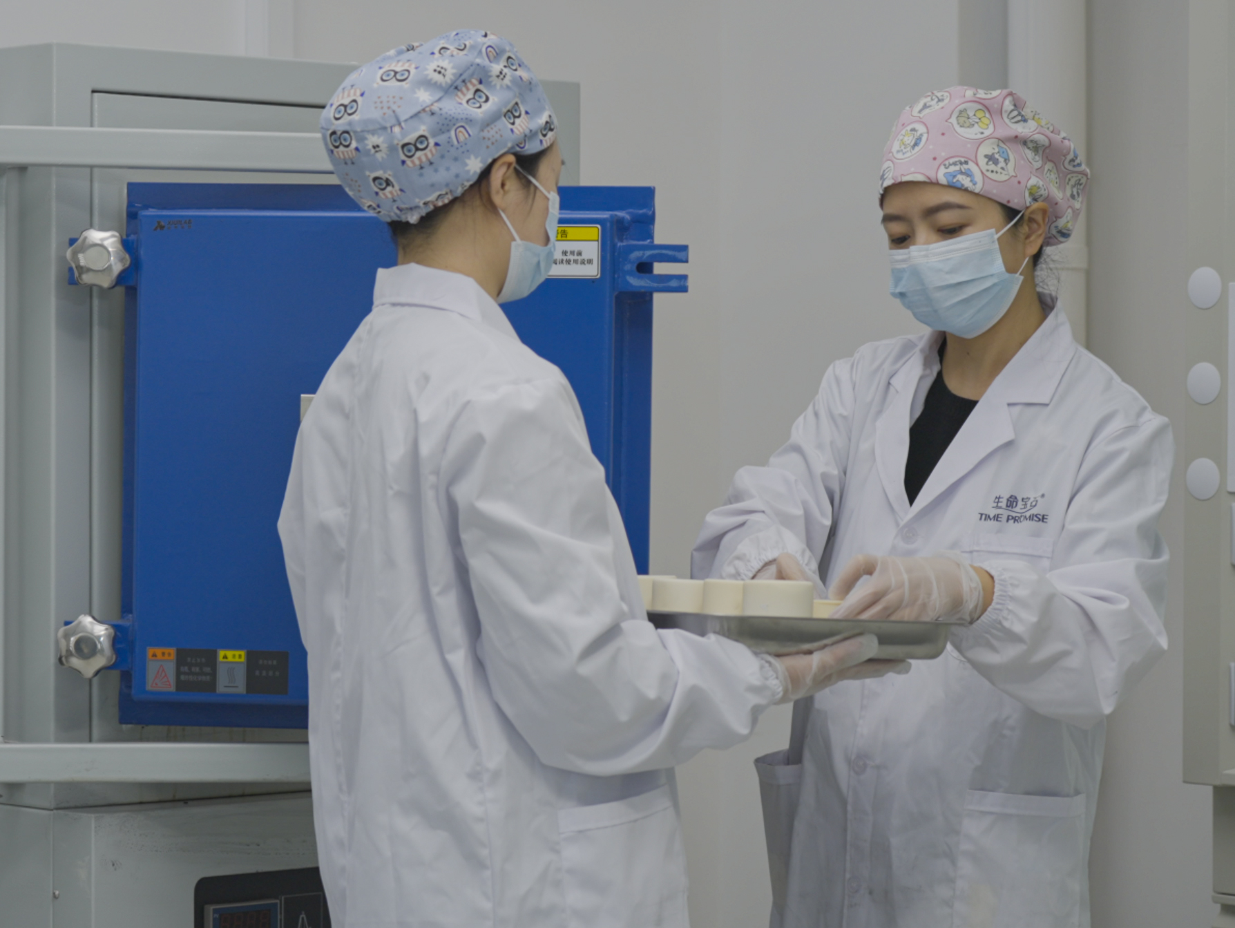 Technician operating HPHT synthesis equipment — industrial diamond manufacturing