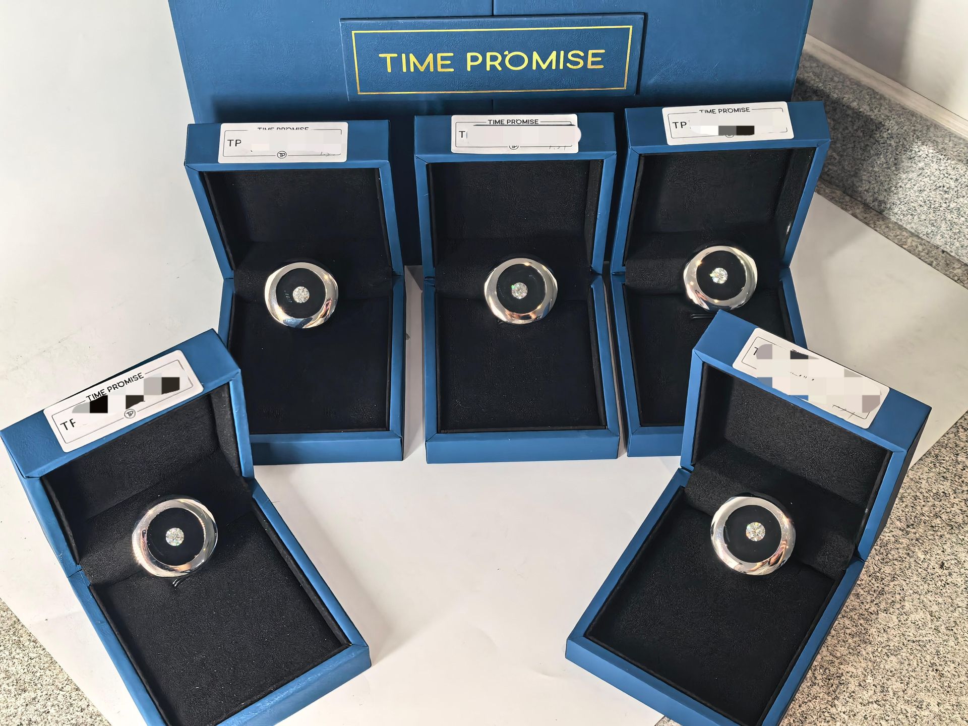 Five finished memorial diamonds arranged in batch grown from antique camphor wood carbon