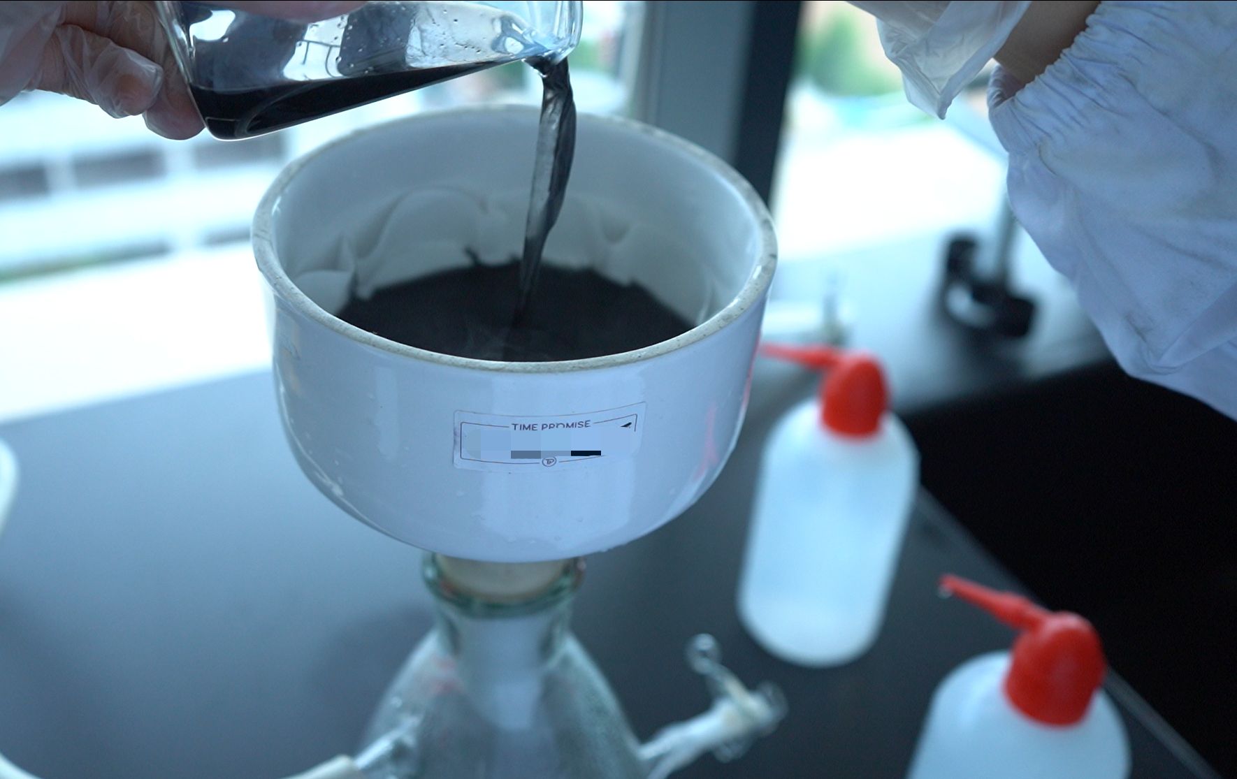 Carbon filtration process in laboratory during purification stage