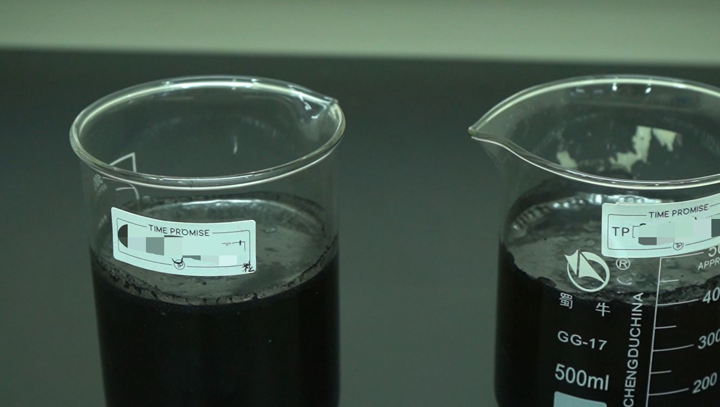 Carbon extraction beakers in laboratory showing chemical purification process