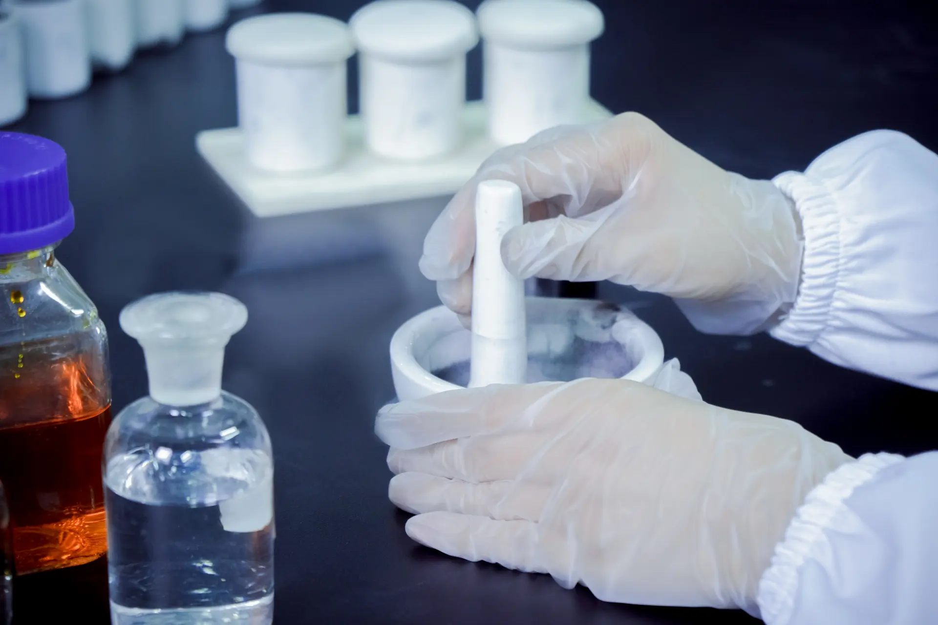 Pet hair sample being weighed on laboratory scale — carbon source preparation for memorial diamond synthesis